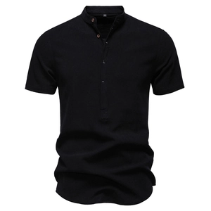 Close-up of black men's short sleeve Henley shirt with mandarin collar and linen texture