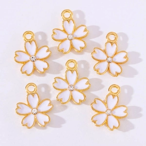 Colorful sakura flower pendants with gold borders and sparkling center crystals for DIY