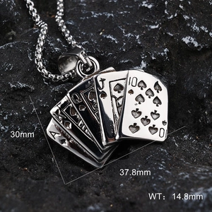 Macro shot of silver poker fan pendant on black stone, size 30mm by 37.8mm stainless steel