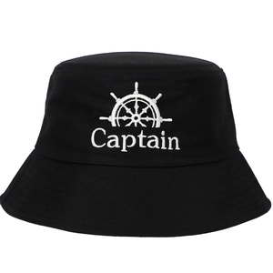 Black cotton bucket hat with white Captain anchor embroidery on white background