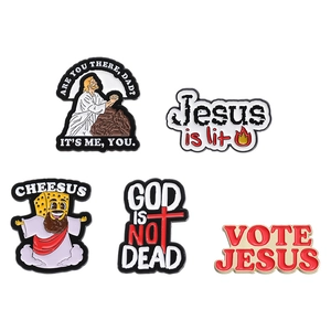 Five creative cartoon Jesus enamel pins with funny phrases like Cheesus and Jesus is lit