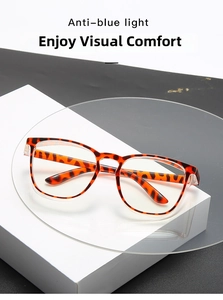 Detail of tortoise shell anti-blue light glasses with transparent temple joints and square frame