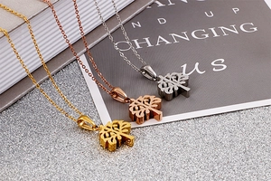 Three-color Tree of Life necklaces in gold, rose gold, and silver stainless steel options