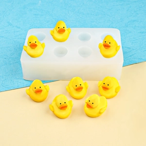 Mini 8-cavity 3D duck silicone mold for DIY chocolate cake decor and resin crafting