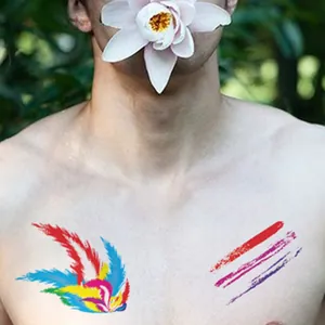Vibrant rainbow feather temporary tattoos shown on model's face for party makeup