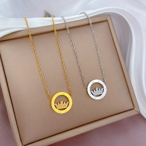 Titanium steel crown necklaces in gold and silver finish on silk and jewelry box