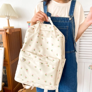 Floral print cream backpack for students with a minimalist aesthetic and large capacity