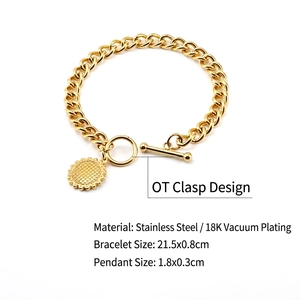 Detail of 18K gold-plated stainless steel Cuban bracelet with OT clasp and sunflower charm