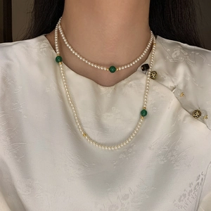 Double-layer faux pearl necklace with green gemstone beads and golden accents for women