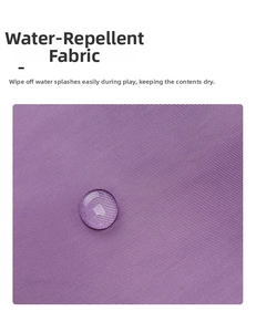 Close-up of purple waterproof Oxford fabric showing texture and water-repellent beads