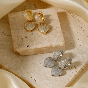 Luxe copper heart hoop earrings with full pavé cubic zirconia in gold and silver finish