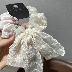 French lace floral scrunchie with oversized bow and elegant chiffon embroidery detail