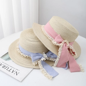 French style sun hat with polka dot ribbon and lace trim in pink and blue options