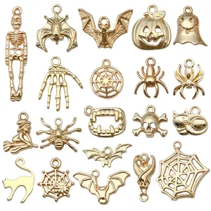 Mix of 20 golden Halloween alloy charms including skulls, pumpkins and spider pendants