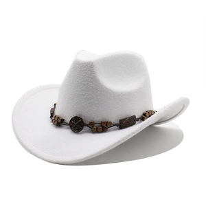Detailed close-up of white wool felt cowboy hat with ethnic style wooden beaded band