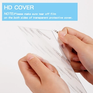 Removing protective film from HD acrylic cover to reveal clear surface for picture frames