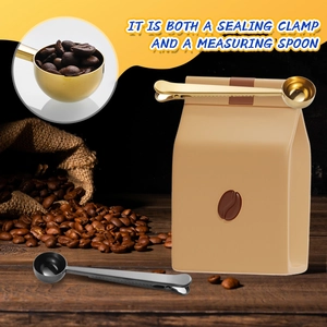 2-in-1 stainless steel coffee spoon and sealing clip in gold and black finishes
