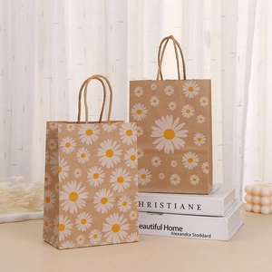 Bolsas de regalo de papel kraft marrón con margaritas blancas para paquetes de fiesta