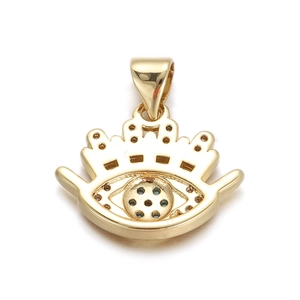 Macro shot of gold-plated evil eye charm with crown top and sparkling zircon inlay