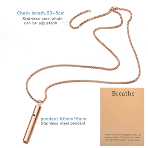 Close-up of rose gold mindfulness whistle pendant with adjustable 60+5cm chain and card