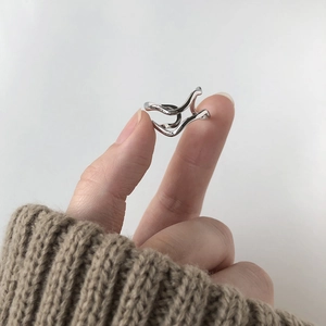 Minimalist silver double-layered wavy open ring in titanium steel on model hand