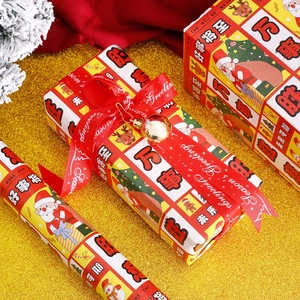 Festive red and yellow Christmas gift wrapping paper with reindeer and Santa patterns