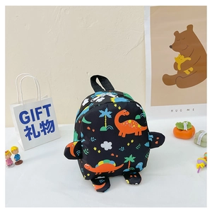 Detail of cartoon dinosaur backpack with 3D wings and vibrant prints for kids