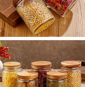 Detail of embossed glass food canisters with bamboo lids and various storage sizes