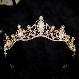Macro detail of a vintage bridal crown featuring sparkling crystals and gold alloy frames