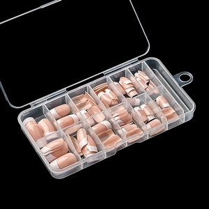 Classic French manicure press-on nails set with nude base and white tips in clear box