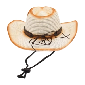 Close-up of vintage straw cowboy hat with distressed burnished edges and leather band