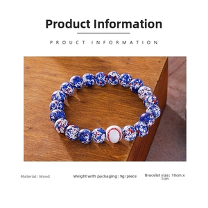 Detail view of wood baseball bracelet with blue starburst beads and 18cm dimensions
