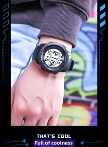 Detailed view of the digital sports watch dial showing fitness tracking and step counter