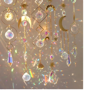Crystal suncatcher wind chimes with gold moon and star patterns for room decor