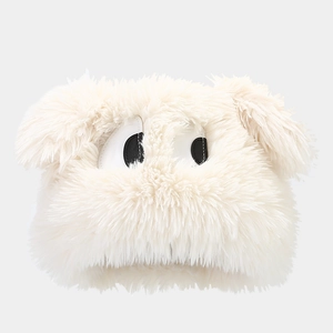 Detailed view of fluffy white plush cartoon monster hat with cute big eyes design