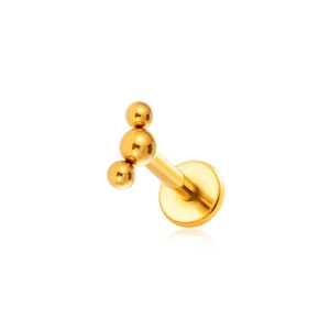 Titanium labret stud with a golden three-ball cluster design and flat back on white background