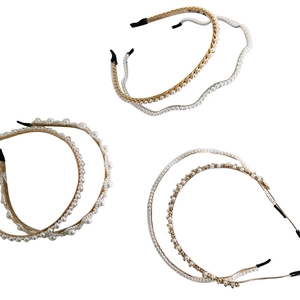 Three-piece set of gold metal headbands with elegant pearls and sparkling rhinestones