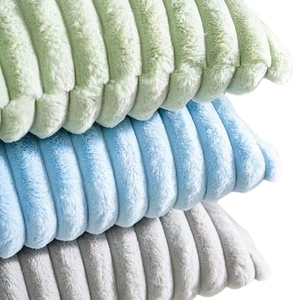 Faux rabbit fur decorative pillows with striped texture in green, blue, and gray colors
