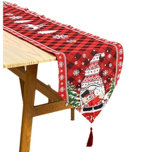 Christmas table runner with red-black plaid, gnome patterns and tassel decorative fringe