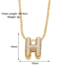 Detail view of gold letter H bubble pendant with pavé cubic zirconia and measurements