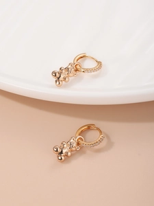 Golden bear dangle earrings with sparkling rhinestones and elegant huggie hoop design