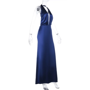 Detail view of deep blue satin halter dress texture on side of mannequin