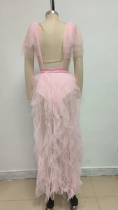 Detail of layered pink mesh ruffles on the back of a V-neck tulle evening dress