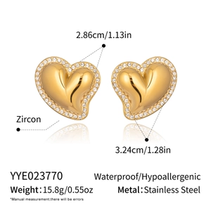 Detailed view of gold heart earrings with zircon inlay and product size specifications
