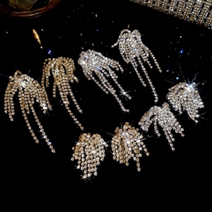 Sparkling long tassel rhinestone earrings in silver and gold fireworks fan design