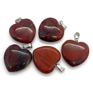 Set of five heart-shaped natural red jasper pendants with polished stone finish