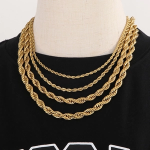 18K gold plated stainless steel twist rope chain necklace displayed on a mannequin