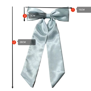 Light blue satin hair clip with large bow and long streamers, 15cm by 28cm size details