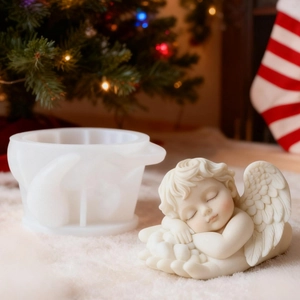 DIY sleeping angel candle silicone mold set with finished cherub wing on palm statue