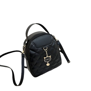 Modern black quilted PU leather mini backpack with stylish gold cat pendant for women